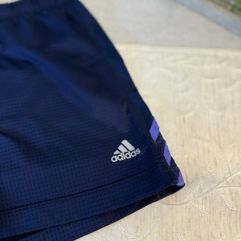 Adidas women's athletic climacool shorts size S. Navy blue with‎ purple stripes